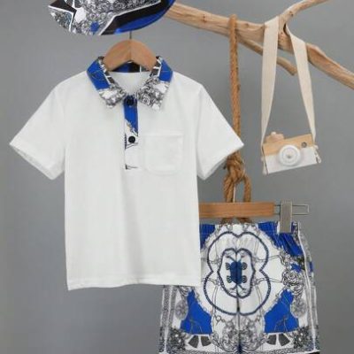 SHEIN Little Boys’ Random Printed Polo Shirt And Shorts Set